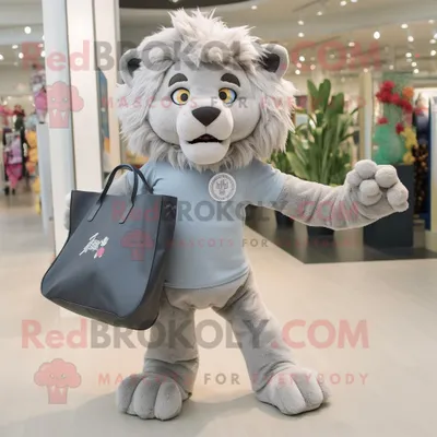 Produktbild von Maskottchen REDBROKOLY Kostümfigur Silberbändiger Löwe bekleidet mit Jeggings und Tragetaschen