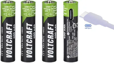 Four AAA batteries and a USB-C cable are displayed against a white background.