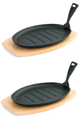Produktbild von Servierpfanne oval Gusseisen mit Holzuntersetzer und Griff 2 Stück
