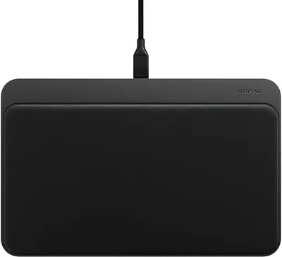 A black Nomad Base Station Pro wireless charger is shown from a top-down perspective against a white background.