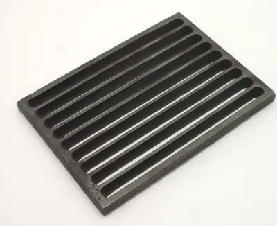 A dark gray, rectangular grate with multiple parallel slots is shown on a white background.