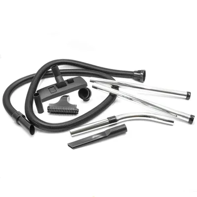 A collection of vacuum cleaner attachments laid out on a white background.