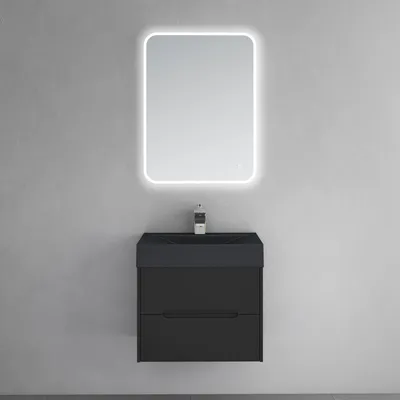 A modern black vanity unit with a grey basin and a lighted mirror above, mounted on a grey wall.
