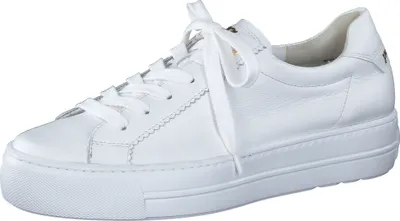 A white leather sneaker is shown from the side against a white background.