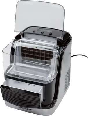 A SilverCrest ice maker with its lid open, showing the ice tray and controls.