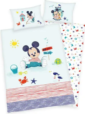Mickey Mouse on a beach with a turtle and a seagull, part of a bedding set.