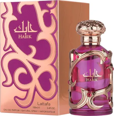 A perfume bottle and its packaging are displayed against a white background.