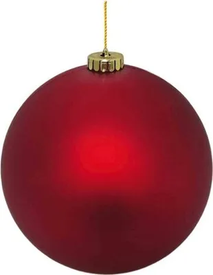A single red Christmas ornament hangs from a gold string against a white background.