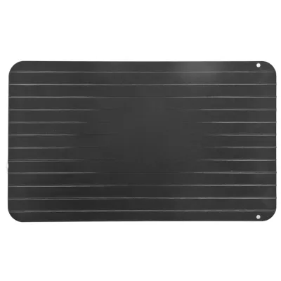 A black thawing plate with horizontal grooves.