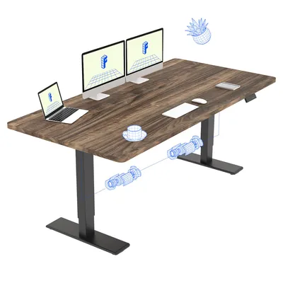 A standing desk with dual monitors, a laptop, and a cup of coffee.