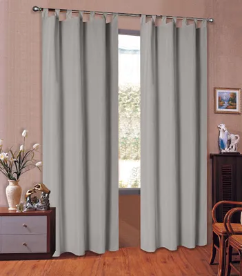 A room interior with curtains covering a window, a dresser, and chairs.