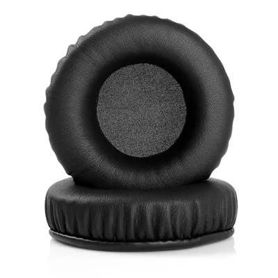 Two black headphone ear pads are stacked on top of each other against a white background.