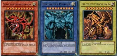 Produktbild von Yu-Gi-Oh - Slifer, Obelisk und Ra - Götterkarten Set in Toploader + Heartforcards Versandschutz