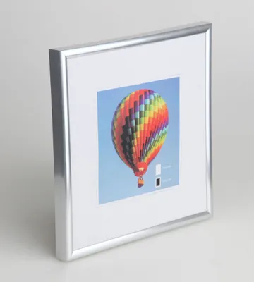 A silver picture frame with a colorful hot air balloon image inside, displayed on a light gray background.