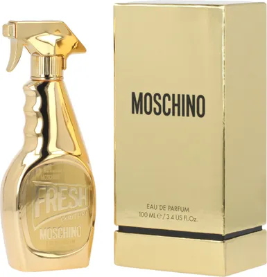 A gold Moschino Fresh Couture Eau de Parfum bottle and its packaging are displayed side-by-side against a white background.