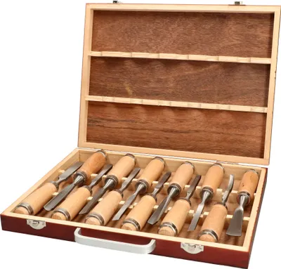 A set of 12 wood chisels in an open wooden case.