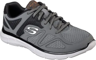 A single athletic shoe is shown from the side against a white background.