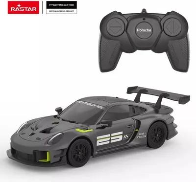A remote-controlled Porsche 911 GT2 RS Clubsport 25 car and its remote control are displayed against a white background.