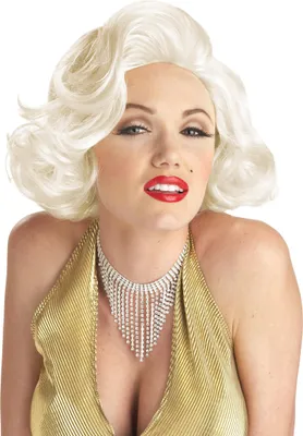 A woman dressed as Marilyn Monroe wearing a blonde wig, gold dress, and diamond necklace.