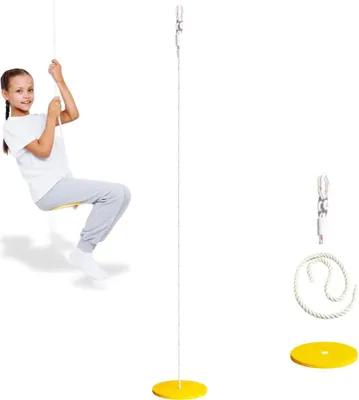 A young girl is using a disc swing.