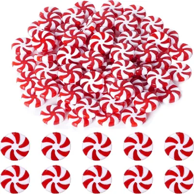 A pile of red and white swirl candies, with a row of individual candies below.
