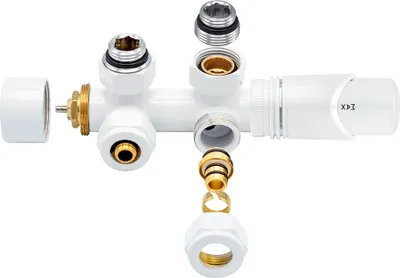 An exploded view of a white radiator valve assembly against a white background.