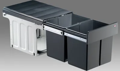 A kitchen waste sorting system with two bins, shown extended from its housing.
