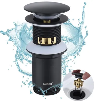 A black pop-up drain assembly for a sink, with water splashing around it.