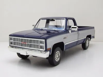 Produktbild von Greenlight Collectibles 13659 GMC K2500 Sierra Grande Wideside Pick Up 1984 blau silber 1:18