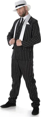 A man wearing a retro gangster costume.