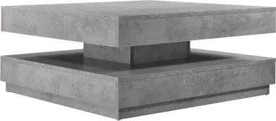 A square coffee table with a concrete look.