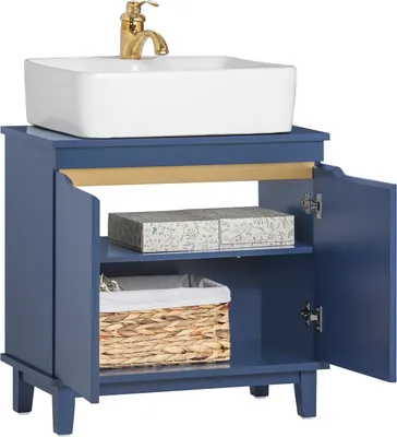 A blue bathroom vanity cabinet with a white sink and a gold faucet.