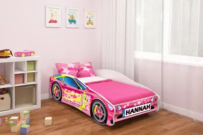 A child's bedroom with a car-shaped bed.