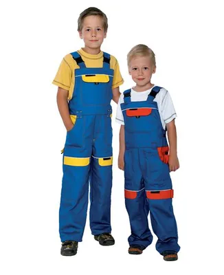 Two children wearing blue overalls with yellow and orange accents, standing against a white background.