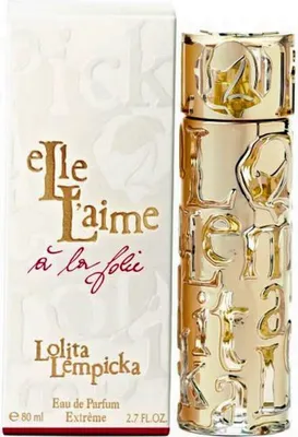 A perfume bottle and its box are displayed side-by-side against a white background.