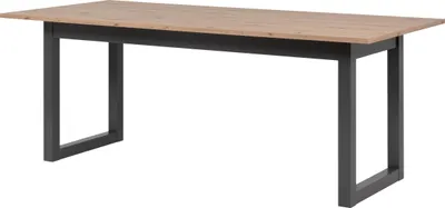 A dining table with a wooden top and dark gray metal legs, shown against a white background.