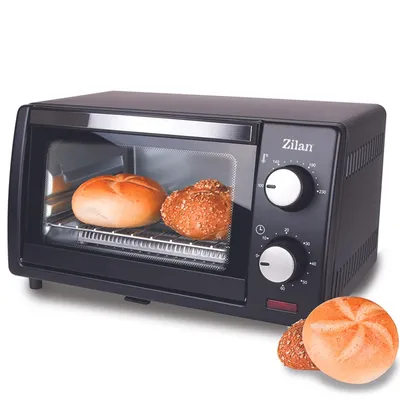 A black Zilan mini oven with two buns inside and two buns in front of it.