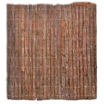 A close-up view of a rustic wooden fence made of vertical logs bound together with white twine.