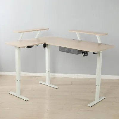An L-shaped standing desk with monitor shelves and a drawer.
