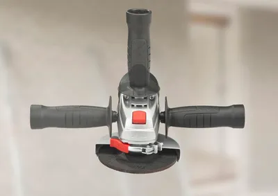 A close-up, front-facing view of an angle grinder.