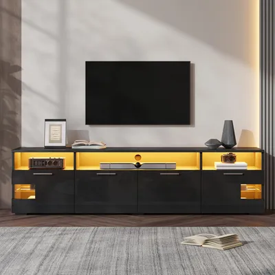 Image de Meuble TV laqué brillant avec éclairage RGB et contrôle via application, meuble TV avec 4 portes et 3 compartiments ouverts, meuble TV avec étagères en verre, couleur noire