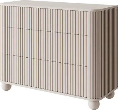 A three-drawer dresser with a fluted front and round legs, presented on a white background.