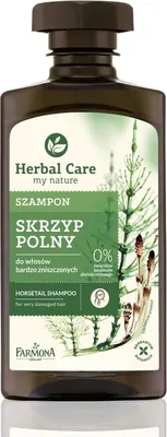 A bottle of Herbal Care Horsetail Shampoo against a light background.