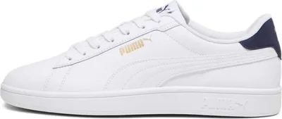 A side view of a white Puma sneaker with navy accents.