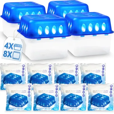 A product shot of multiple dehumidifier boxes and refill packs arranged on a white background.