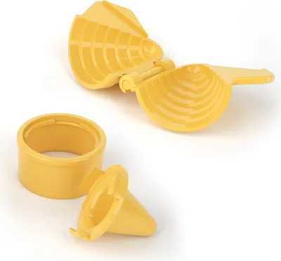A set of yellow plastic molds for making small cakes or pastries, arranged on a white background.