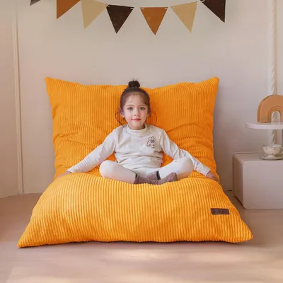 Imagen del producto de Gran puff para niños, fabricado con suave tela de corcho, funda desmontable y lavable, relleno de espuma, ideal para salas de juegos