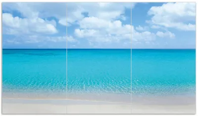 Produktbild von Wallario Herdabdeckplatte aus Glas, Größe 90 x 52 cm 3-teilig, Motiv Sandstrand und blaues Meer