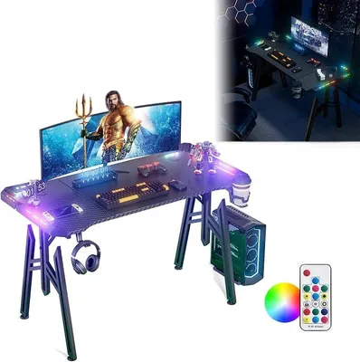 Imagen del producto de Escritorio para gaming con iluminación LED, mesa para ordenador con portavasos y soporte para auriculares, superficie de fibra de carbono, mesa para videojuegos, color , escritorio ergonómico para gamers, ideal para dormitorios