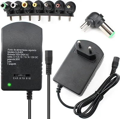 Produktbild von Universal Netzteil Ladegerät Steckernetzteil mit 7 Adapter Stecker 3V-12V 3A 3000mA AC DC 30W Aufsätze Ladekabel Netzgerät Notebook Laptop Retoo